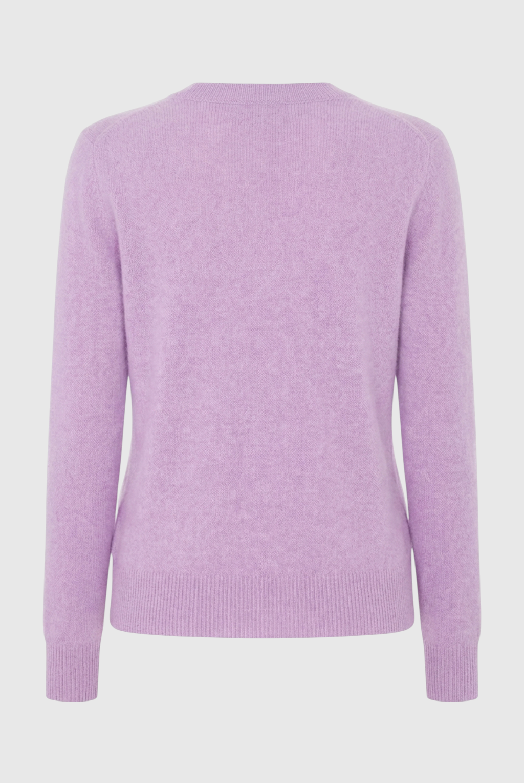 Isabella Lumina Wear cozy purple knit sweater with V-neckline, long sleeves, and ribbed cuffs, casual winter fashion for women.
