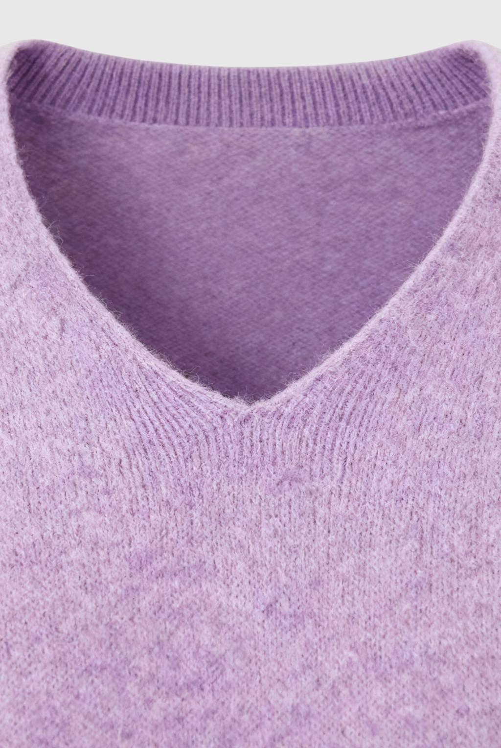 Lumina Wear Isabella purple knit sweater with V-neckline, featuring cozy, soft fabric and a stylish fit.