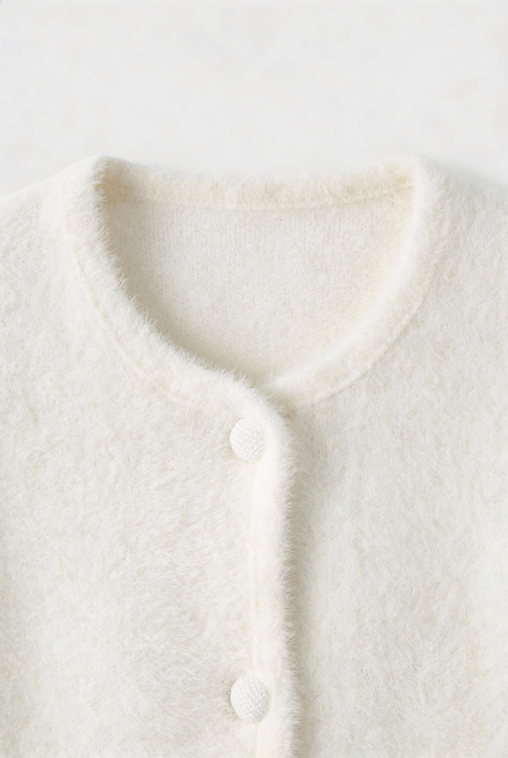 Lumina Wear Isabella cozy white open-front cardigan sweater with relaxed fit, displayed on a model.