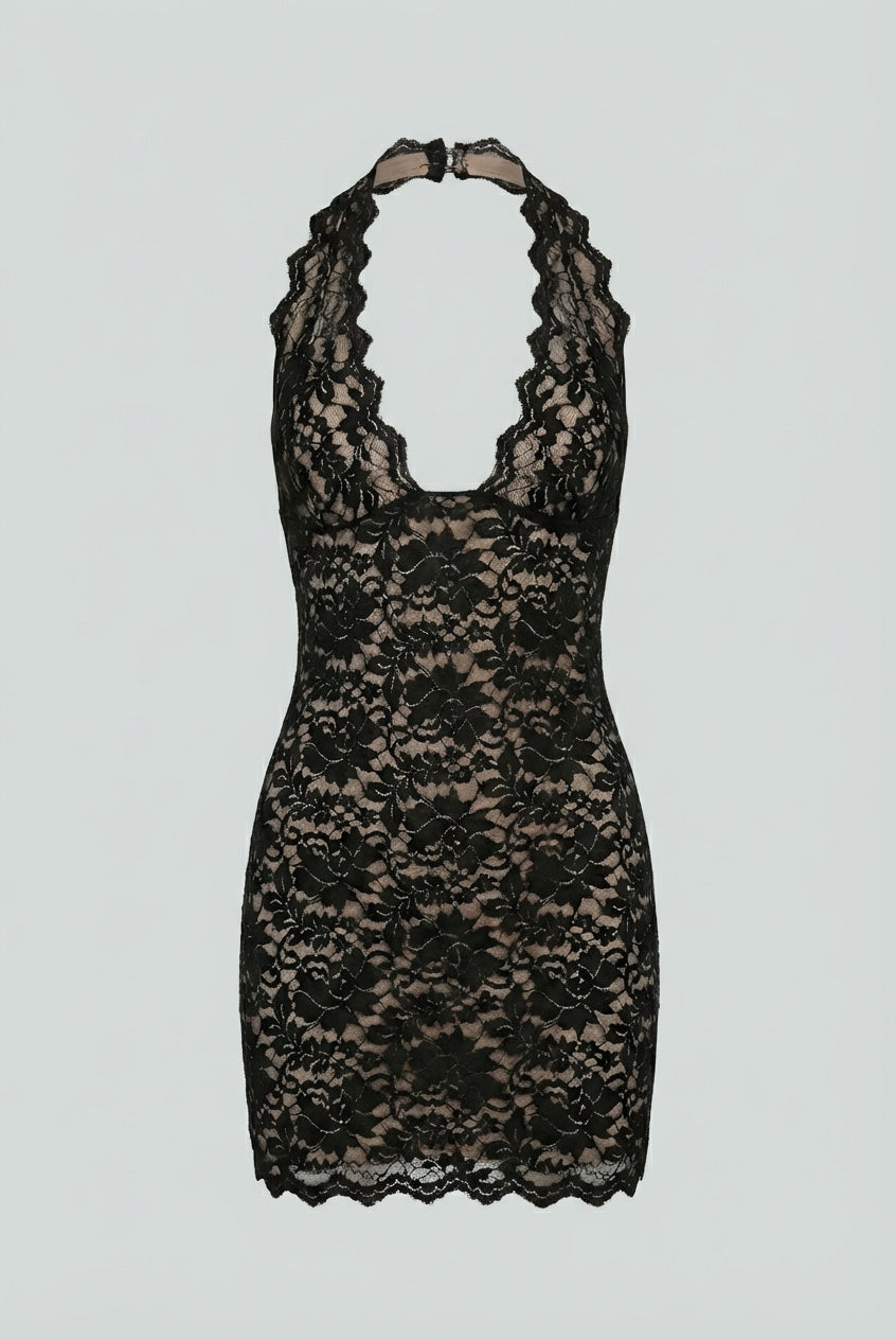 Black backless mini dress by Lumina Wear featuring a versatile cut, elegant design, and fitted silhouette for women.