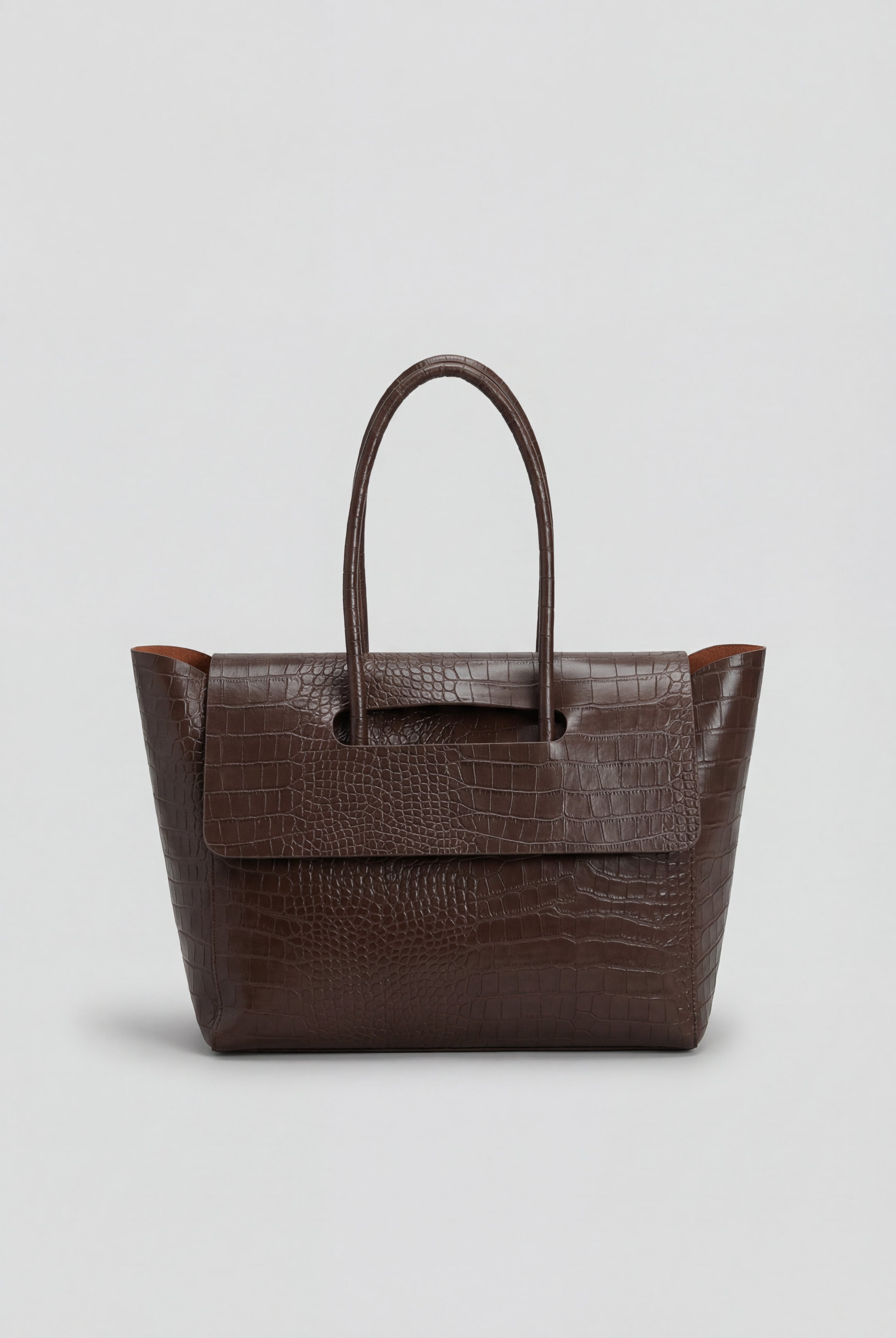 Elegant black crocodile leather handbag with adjustable strap from Lumina Wear, featuring a sleek, sophisticated design.