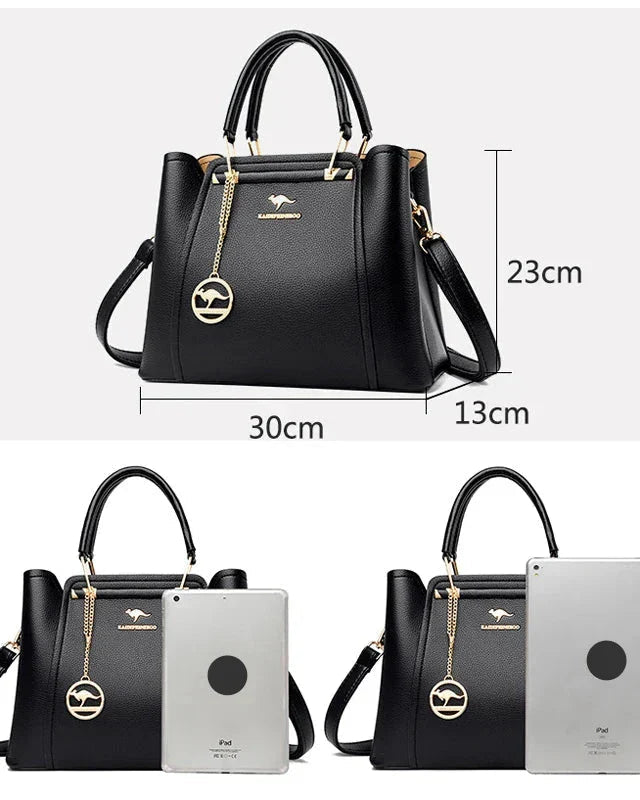 Elegant black leather handbag with gold accents from Lumina Wear, featuring a structured design and stylish details.