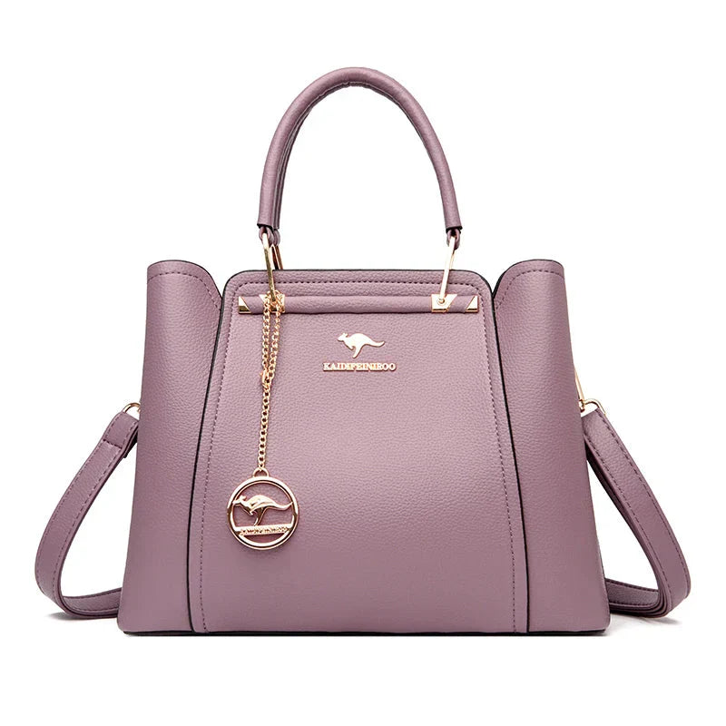Elegant black leather handbag with gold accents by Lumina Wear, featuring a structured design and stylish details.
