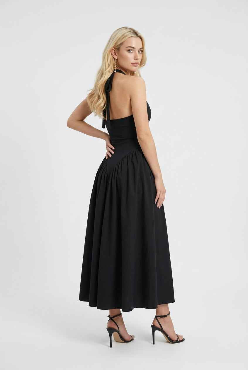Elegant black midi dress from Lumina Wear featuring a flattering fit and stylish design, perfect for formal occasions.