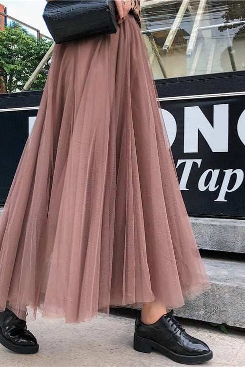 Elegant black tulle skirt for women by Lumina Wear, featuring a flattering fit and feminine design.