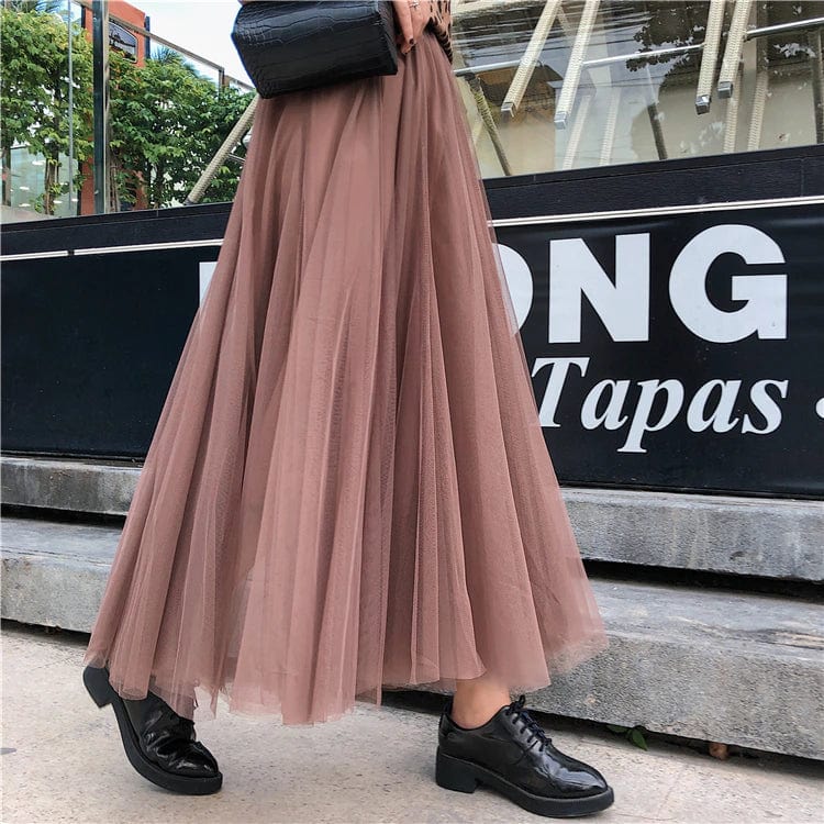 Elegant black tulle skirt for women by Lumina Wear, featuring a flattering fit and feminine design.