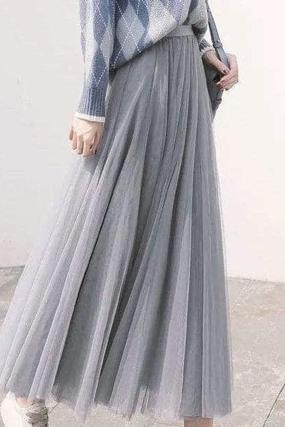 Elegant black tulle skirt by Lumina Wear, featuring a flattering fit and lightweight, flowy fabric for women.