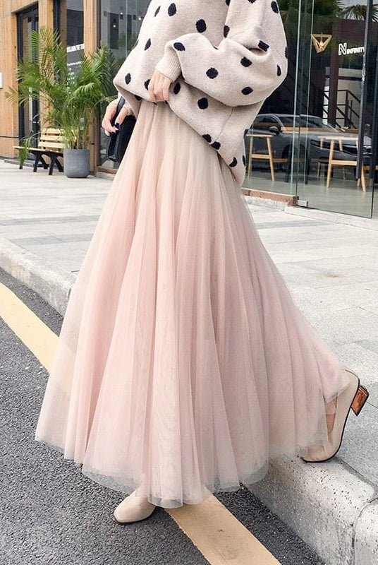 Elegant black tulle skirt for women by Lumina Wear, featuring a flattering fit and stylish design.