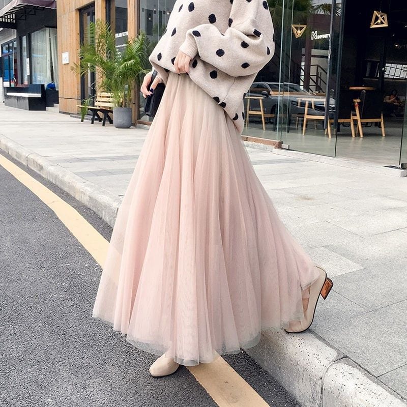 Elegant black tulle skirt for women by Lumina Wear, featuring a flattering fit and stylish design.