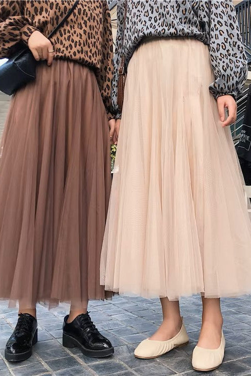 Elegant black tulle skirt for women by Lumina Wear, featuring a flattering fit and stylish design.