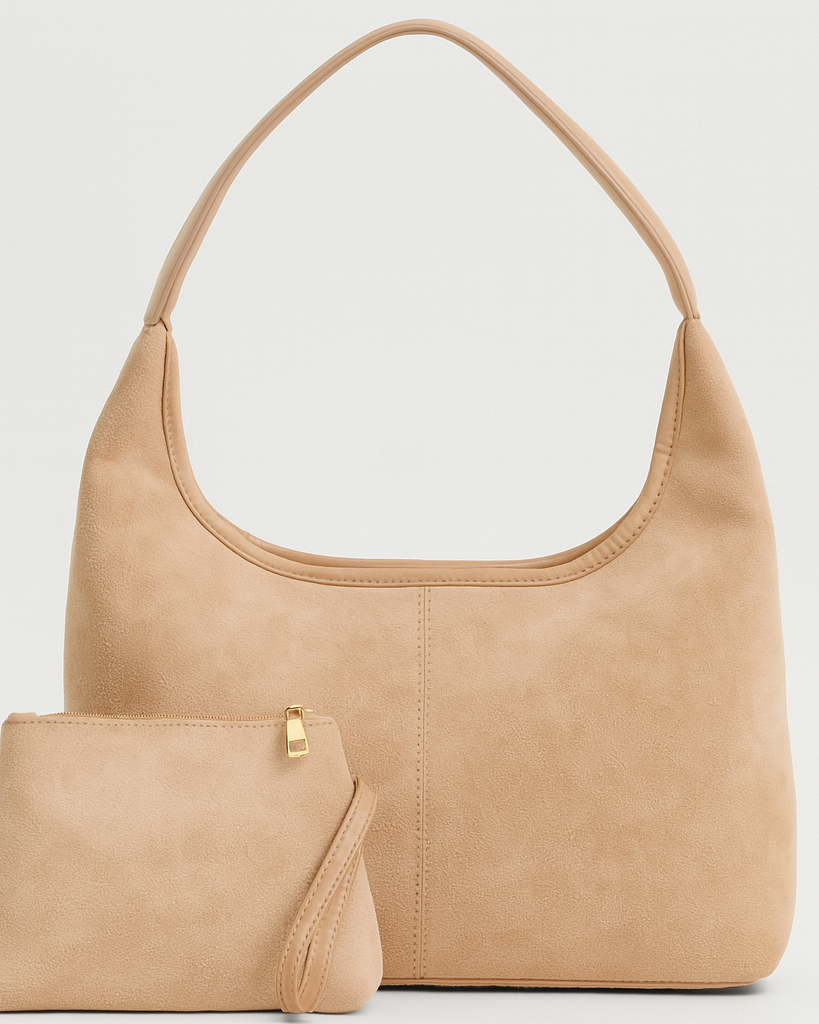 Elegant black vegan suede tote bag from Lumina Wear featuring a spacious handbag design and stylish handles.