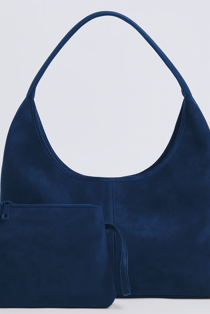 Elegant black vegan suede tote bag from Lumina Wear, featuring a spacious design and stylish hand-held carry.