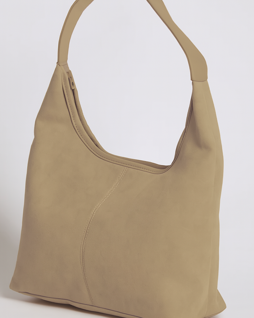 Elegant black vegan suede tote bag by Lumina Wear, featuring a spacious design and stylish handles.
