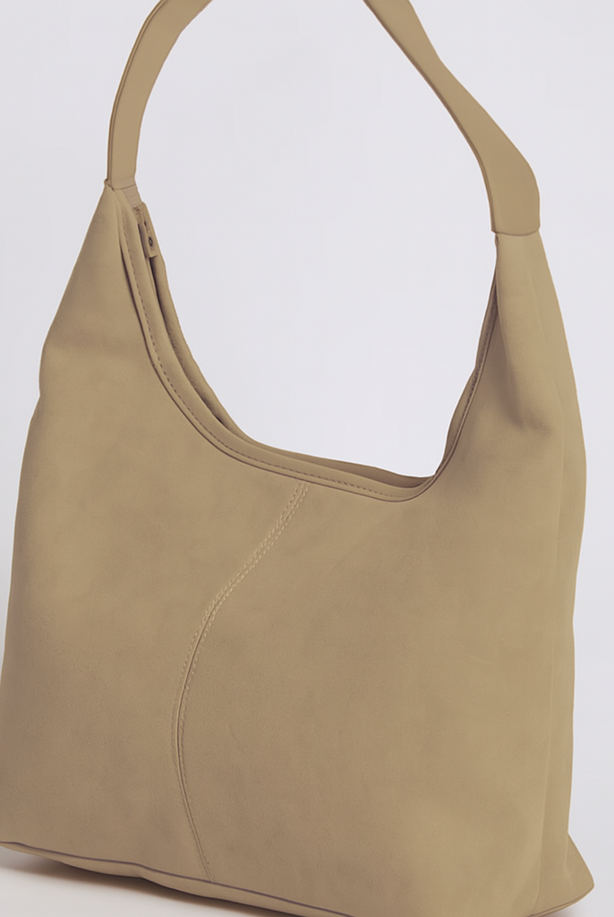 Elegant black vegan suede tote bag from Lumina Wear, featuring a spacious design and sturdy handles for stylish everyday use.