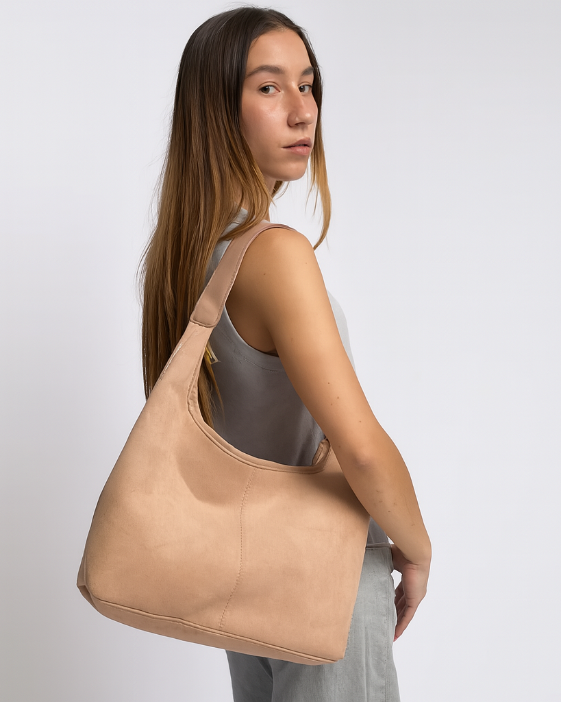 Elegant black vegan suede tote bag by Lumina Wear featuring a spacious design and sleek handles.