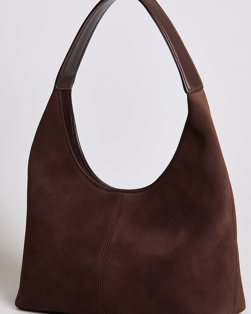 Elegant black vegan suede tote bag from Lumina Wear, featuring a spacious handbag design with sleek handles and stylish details.