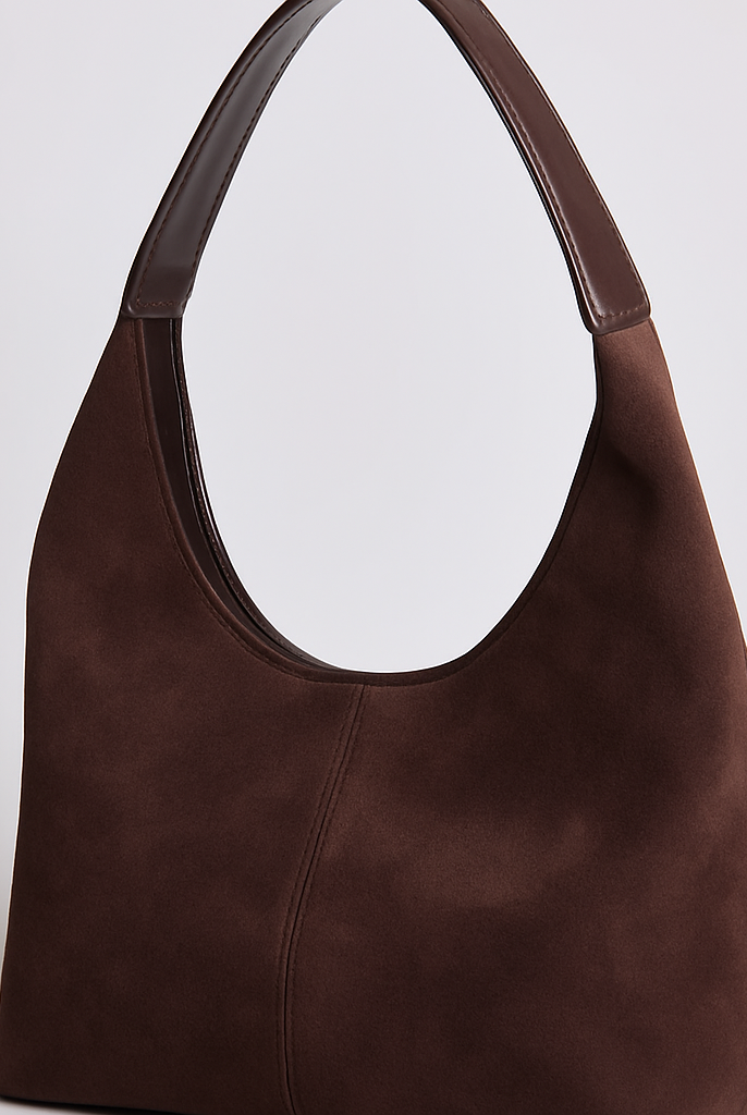 Elegant black vegan suede tote bag from Lumina Wear with sleek design, perfect for stylish daily use.