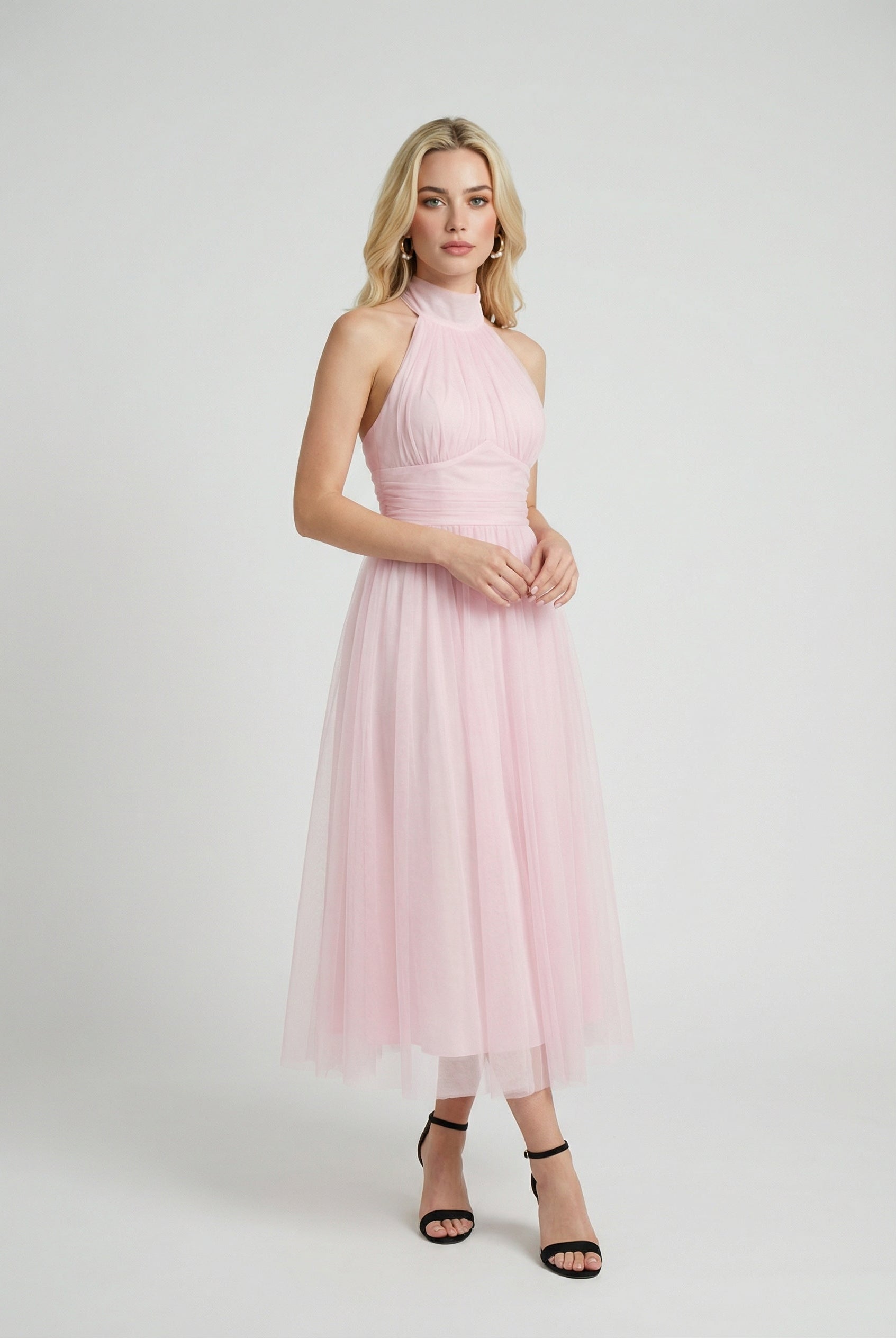 Elegant blush midi dress from Lumina Wear featuring a flattering silhouette, perfect for sophisticated occasions.