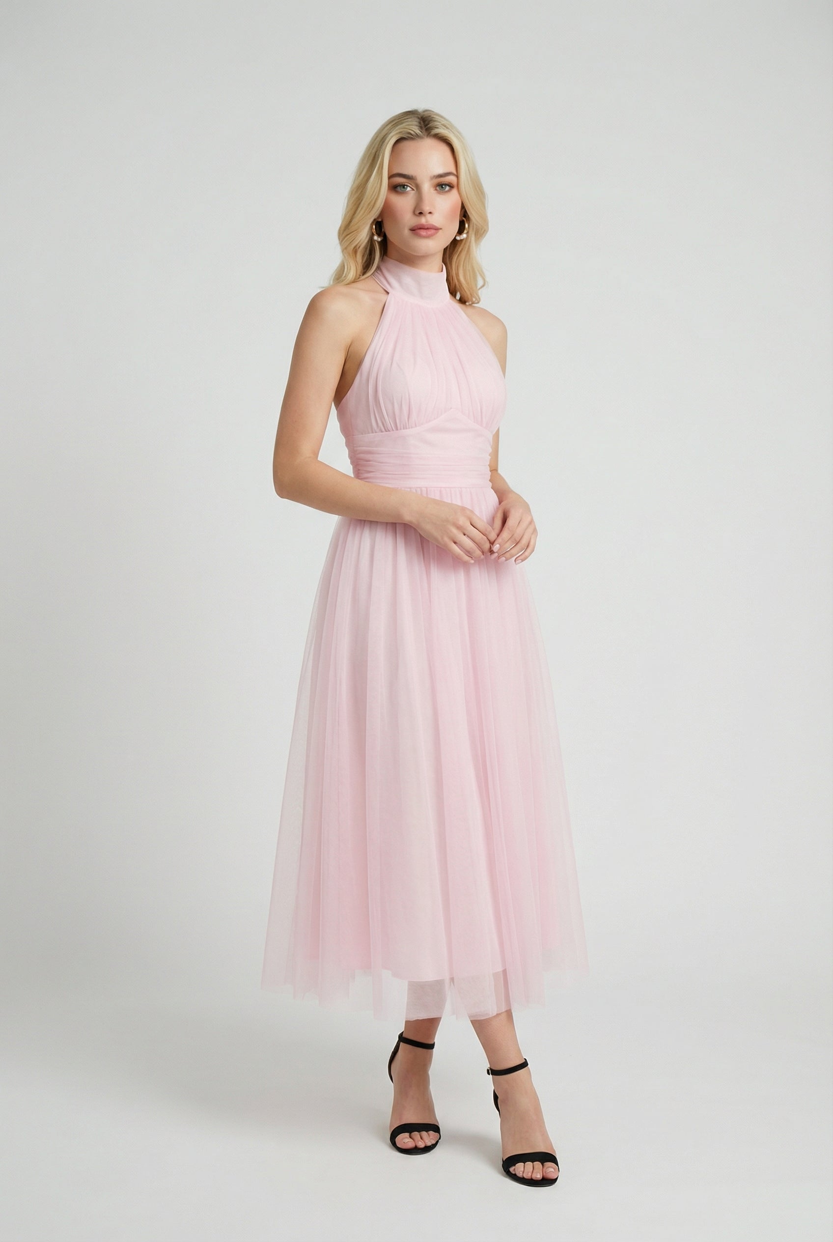 Elegant blush midi dress from Lumina Wear featuring a flattering silhouette, perfect for sophisticated occasions.