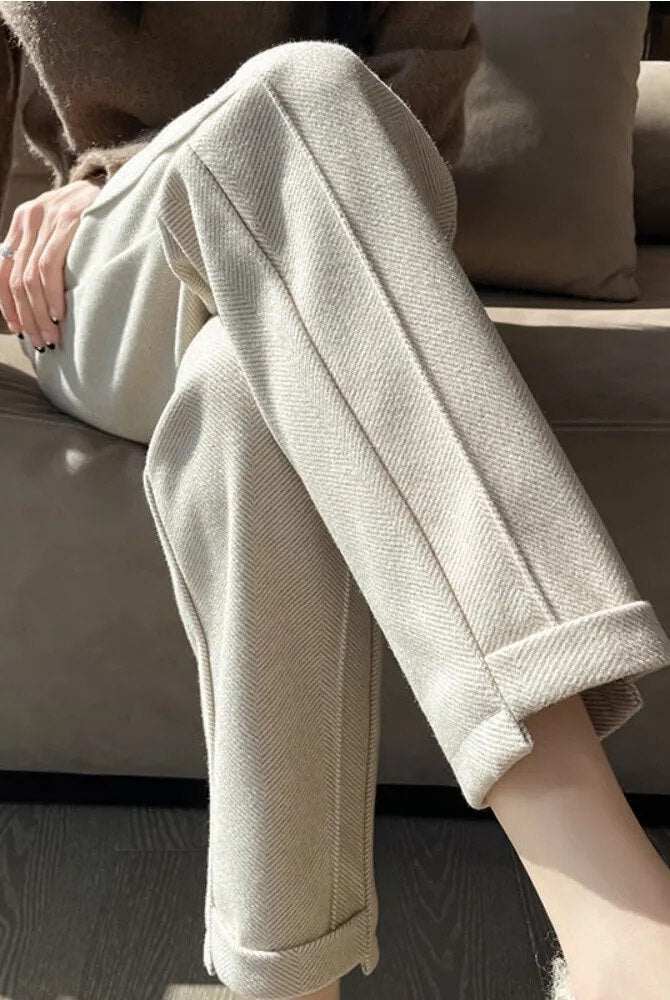 Gray high-waisted pencil trousers by Lumina Wear, part of the Isabella collection, styled for a sleek, elegant look.