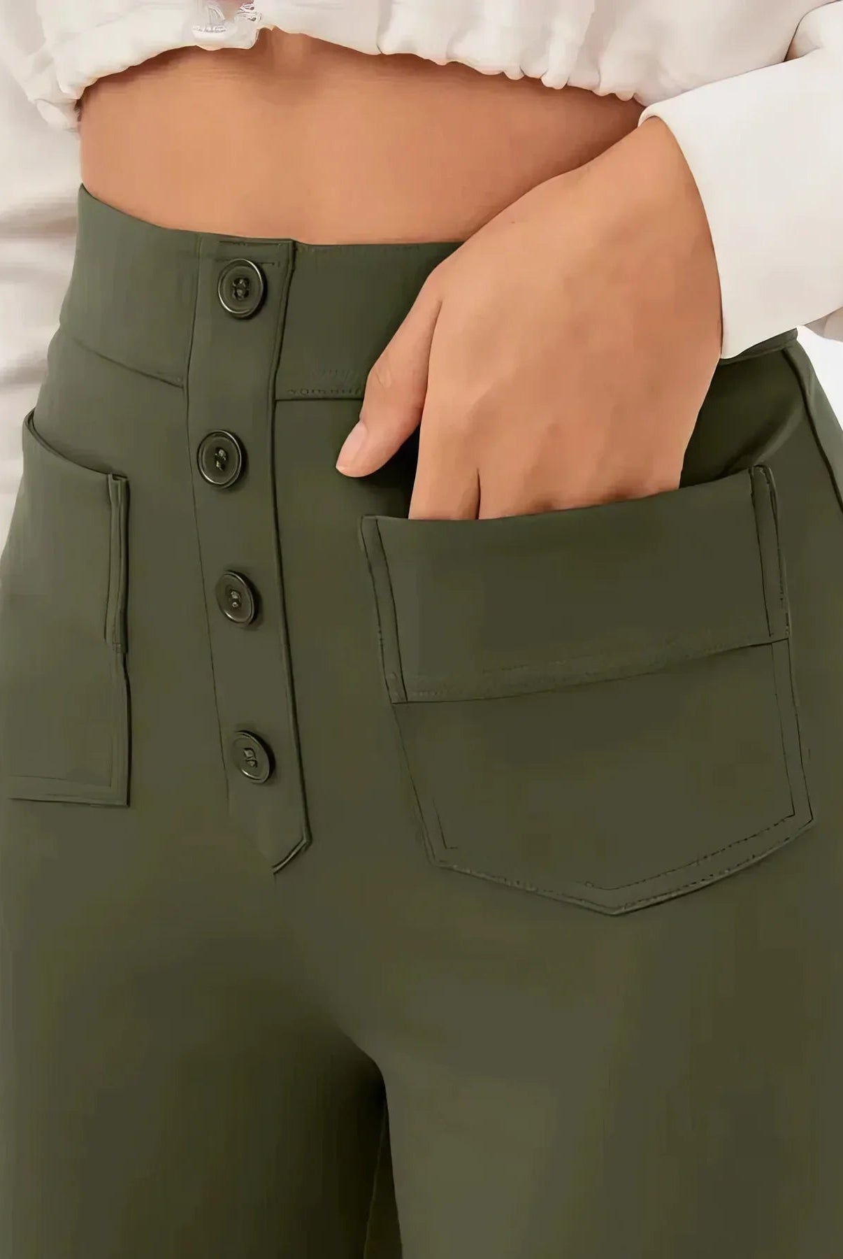 Lumina Wear Isabella high-waisted women's trousers in green, featuring a flattering fit and elegant style.