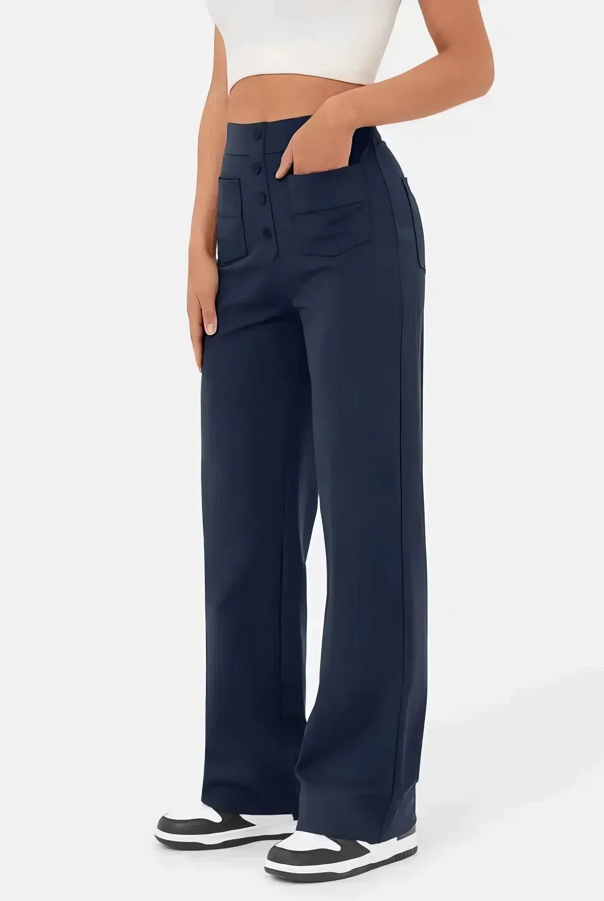 Green women's high-waisted trousers by Lumina Wear, stylish and flattering fit, elegant design perfect for sophisticated outfits.