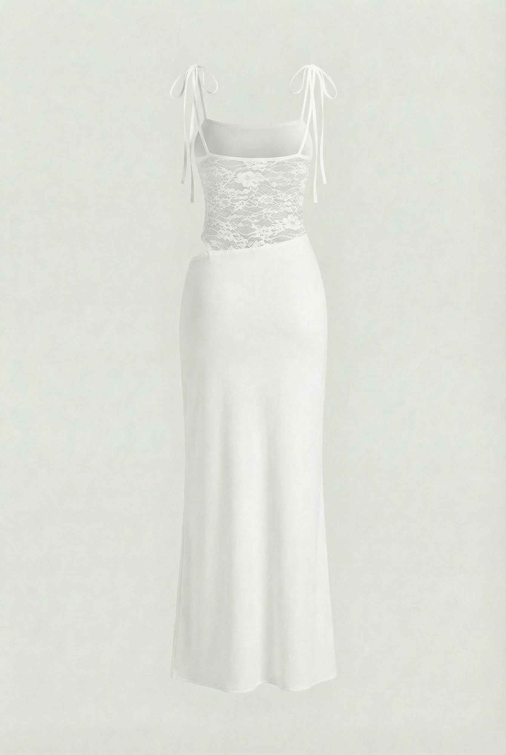 White women's dress by Lumina Wear featuring elegant lace details and a flattering silhouette.