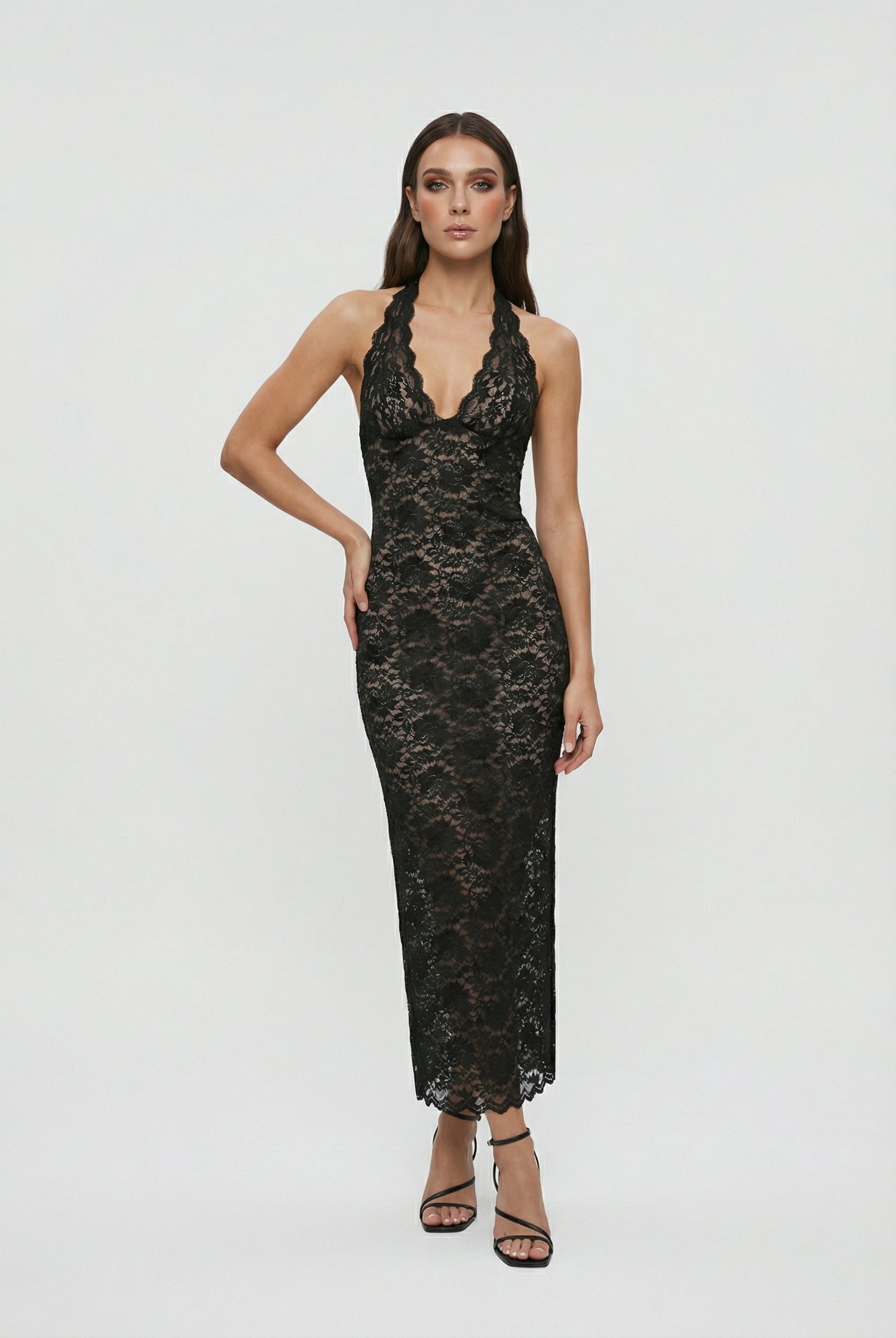 White lace maxi dress by Lumina Wear featuring a flattering fit and elegant design, perfect for formal occasions.