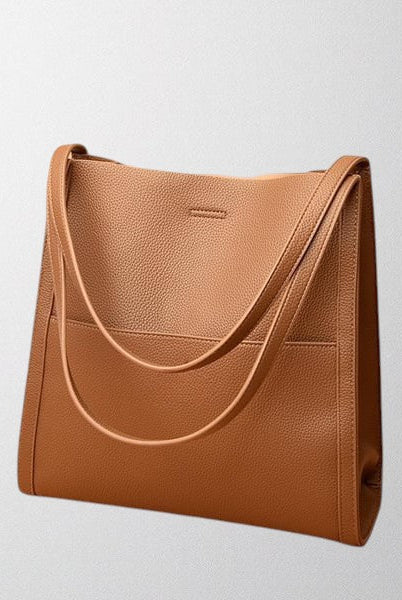 Brown Isabella leather shoulder bag by Lumina Wear featuring a structured design and spacious interior.