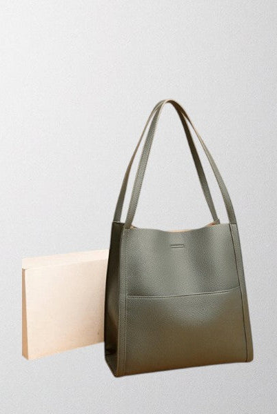 Lumina Wear Isabella leather shoulder bag in brown featuring a structured design and spacious interior for stylish storage.