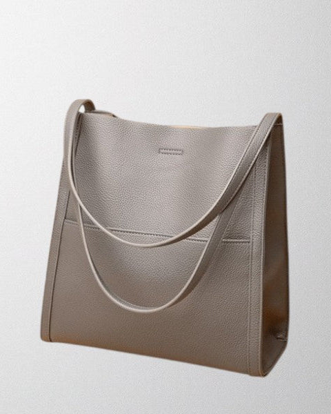 Brown Lumina Wear Isabella structured leather shoulder handbag with spacious interior and elegant design.