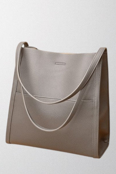 Lumina Wear Isabella structured leather shoulder bag in brown with spacious interior and elegant design.