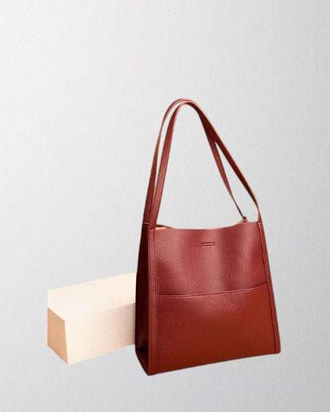 Lumina Wear Isabella leather shoulder handbag in brown with a structured, spacious design and elegant style.