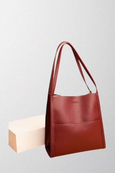 Lumina Wear Isabella structured leather shoulder bag in brown with spacious design and elegant style.