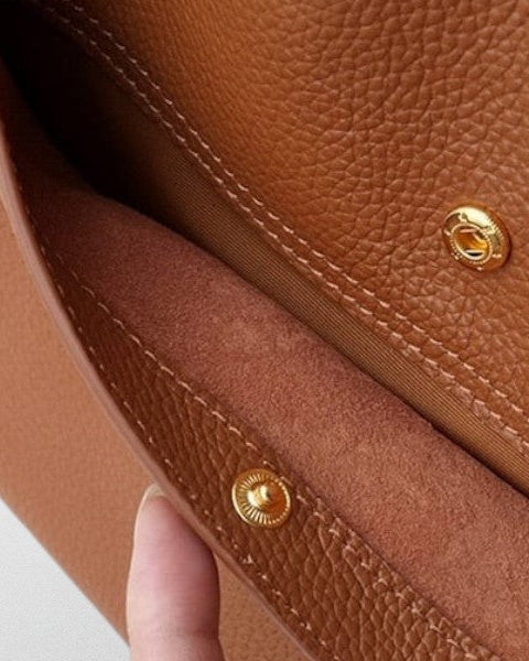 Lumina Wear Isabella structured leather shoulder bag in brown, spacious handbag with elegant design and sturdy handle.