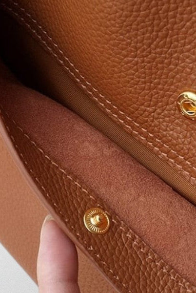 Lumina Wear Isabella structured leather shoulder bag in brown with spacious design and elegant craftsmanship.