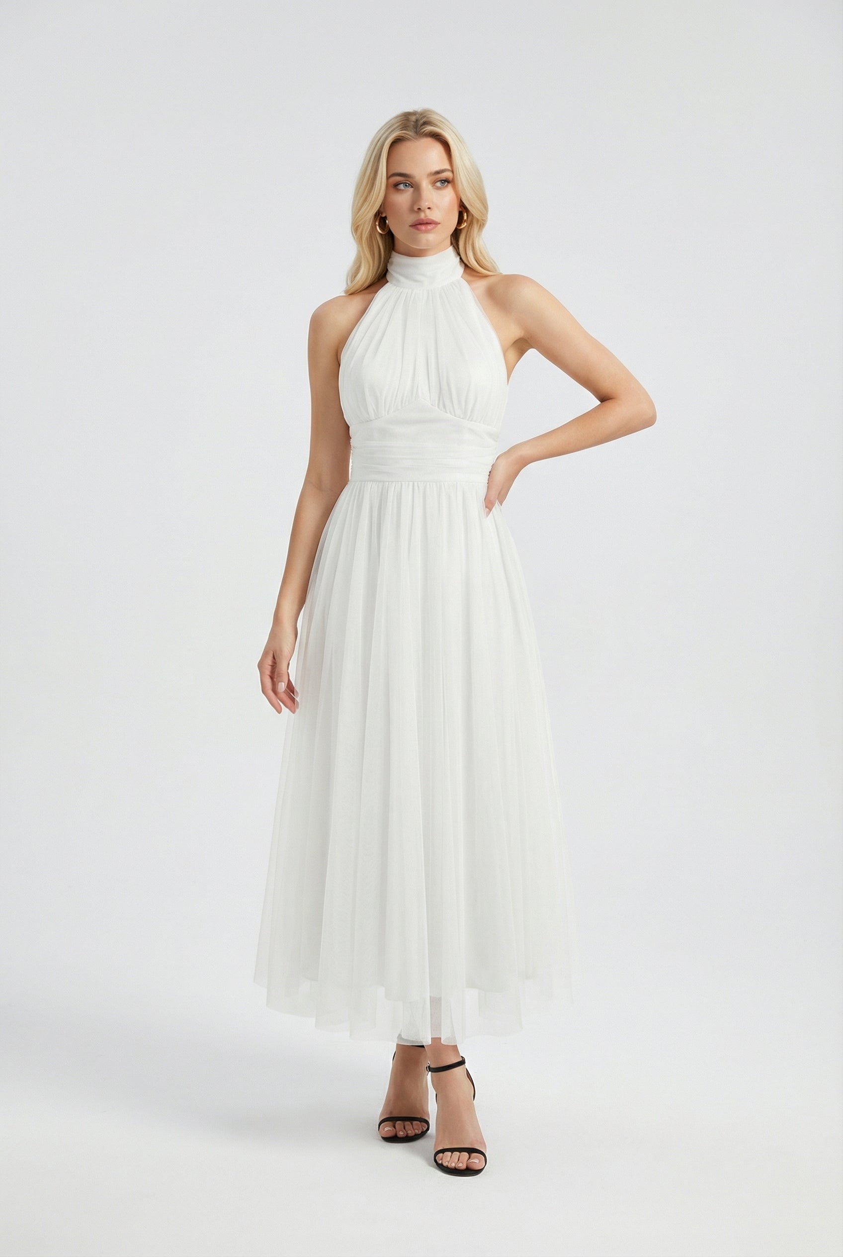 Elegant white midi dress by Lumina Wear featuring a flattering silhouette, perfect for women’s stylish occasions.