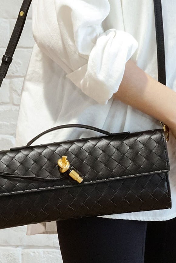 Elegant woven brown handbag with adjustable strap by Lumina Wear, featuring a stylish design and versatile carrying options.