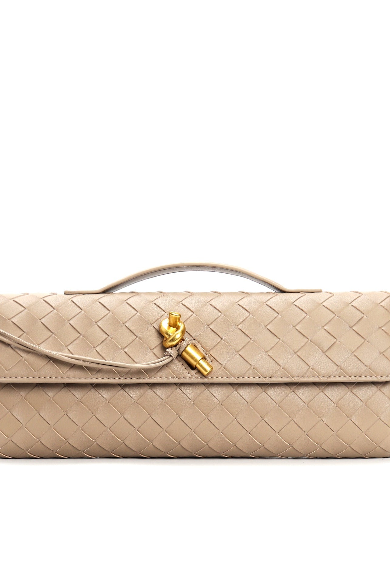 Elegant woven brown Lumina handbag with adjustable strap, showcasing its stylish design and craftsmanship.