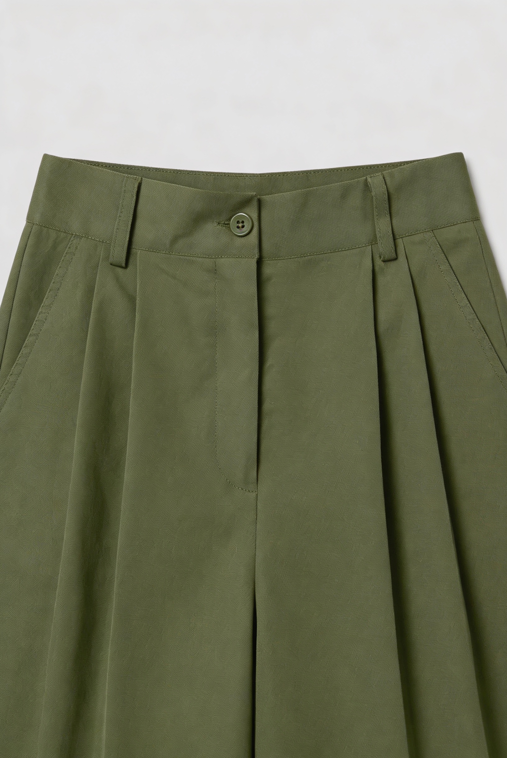 Isabella Lumina green palazzo pants with flowy design and stretch fabric, featuring wide-leg style and comfortable fit.