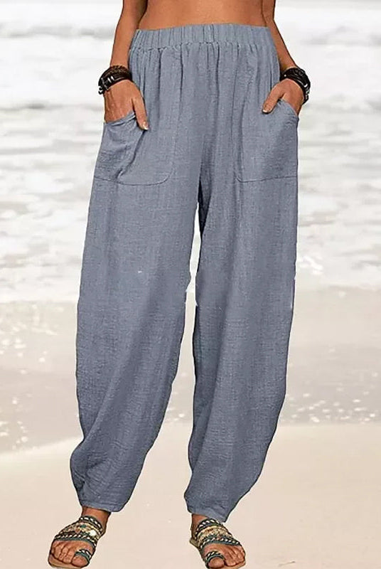 Isabella high-waisted black harem trousers with casual fit by Lumina Wear, featuring a relaxed and comfortable style.