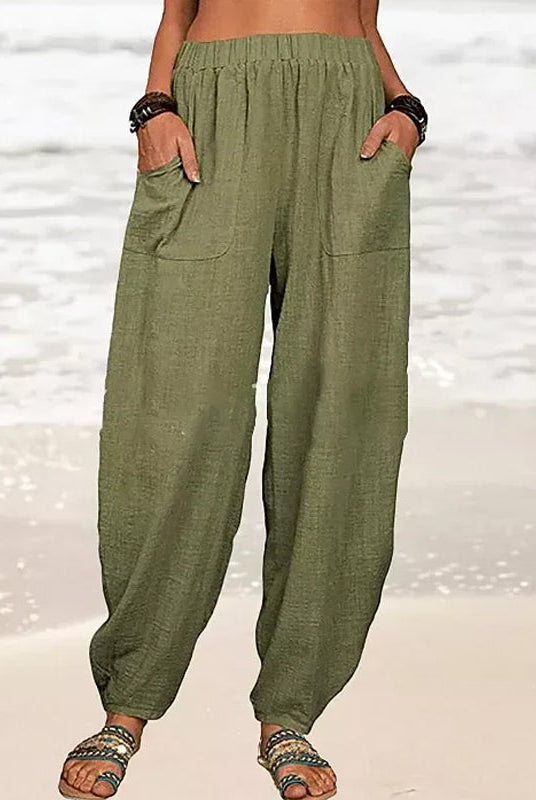 Isabella Lumina high-waisted black harem trousers with a casual fit, featuring a relaxed style and comfortable design.