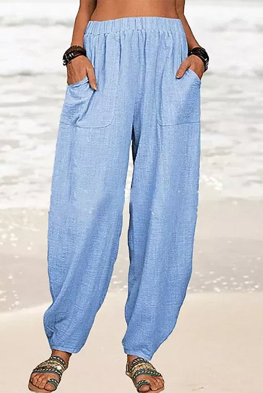 Isabella high-waisted black harem trousers with casual fit from Lumina Wear, featuring a relaxed, comfortable style.