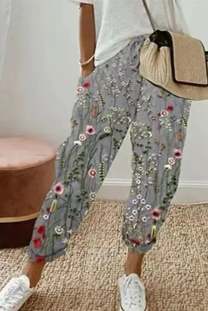 Isabella Lumina Wear lightweight breathable grey linen trousers, multicolor design, size 34, stylish and comfortable for everyday wear.