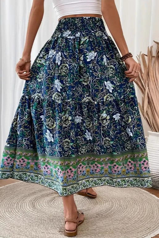 Lightweight floral maxi skirt with layered design from Lumina Wear, in green, displayed on a model.