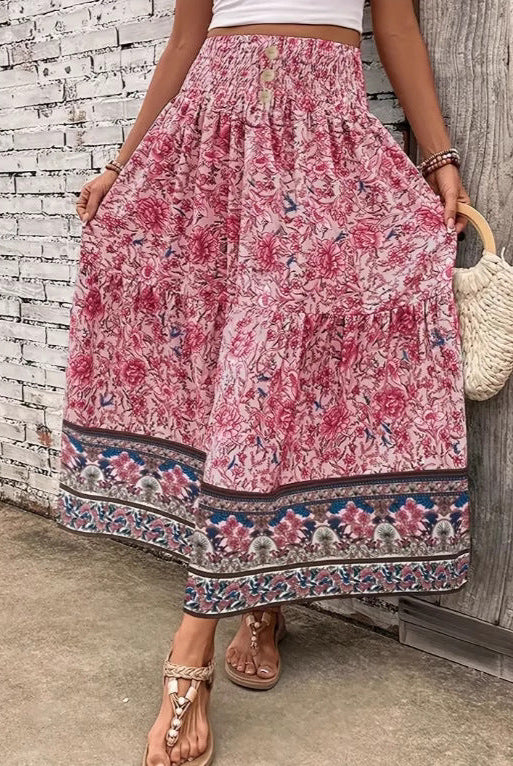 Lightweight floral maxi skirt with layered design by Lumina Wear, featuring green fabric and flowing style.