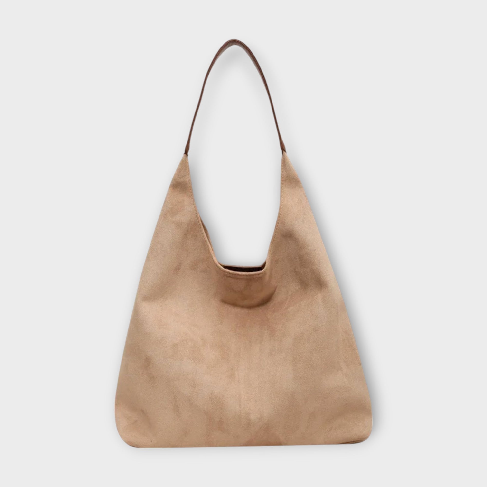 Brown Isabella Lumina Wear minimalist slouch handbag with soft, structured design, featuring a casual and stylish look.