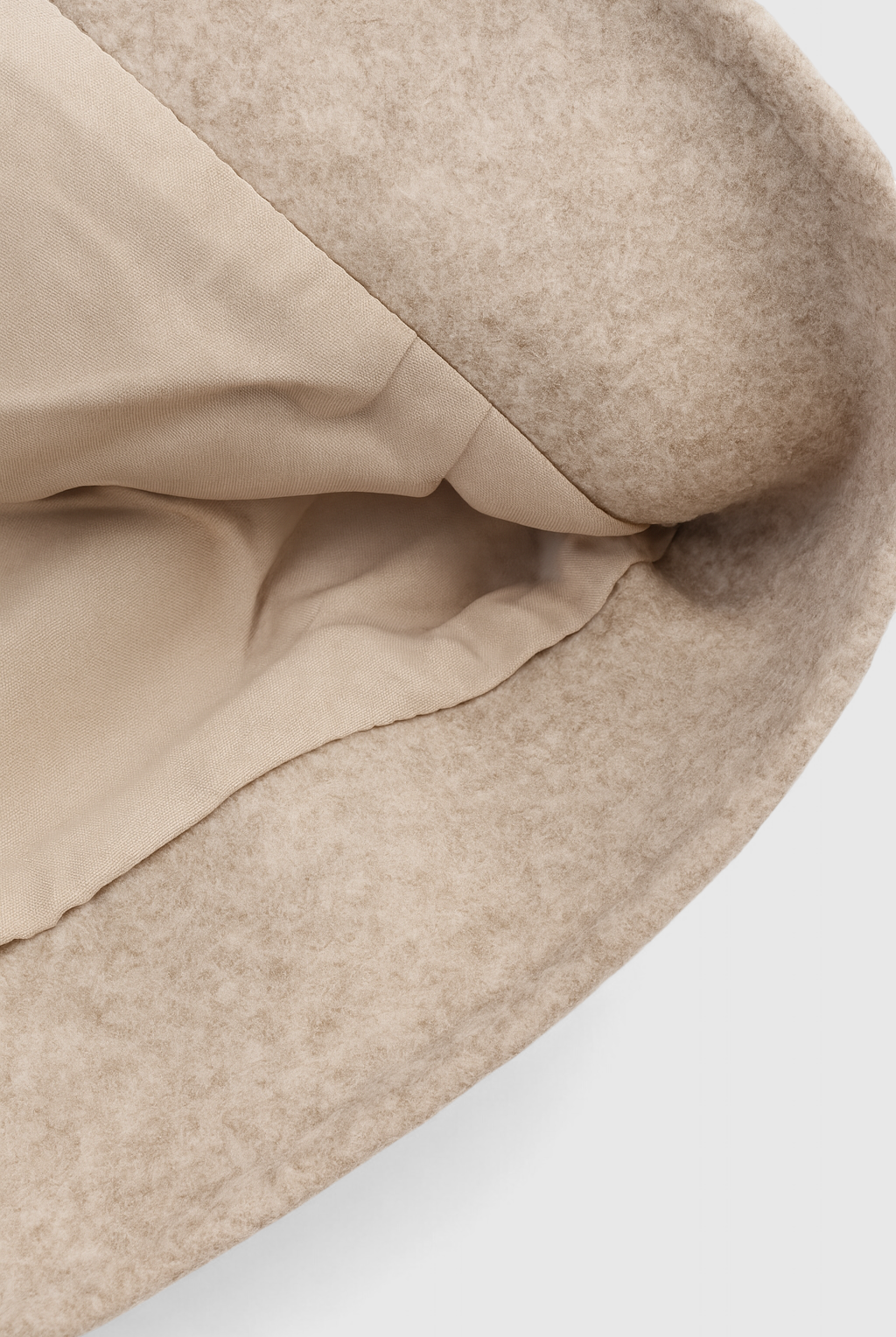 Beige Isabella Lumina Wear cropped zip-up jacket with pockets, modern design, and fitted style, perfect for casual wear.