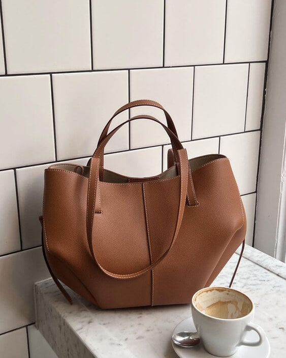 Brown Isabella oversized vintage handbag by Lumina Wear with versatile straps, stylish and spacious for everyday use.