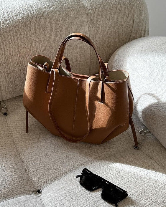 Lumina Wear Isabella oversized vintage handbag with versatile straps, brown leather, stylish and spacious for everyday use.